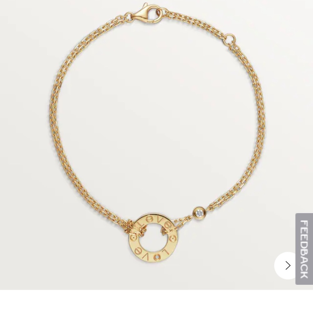 LOVE bracelet,18K yellow gold set w 2 brilliant cut diamonds totaling 0.03 carat